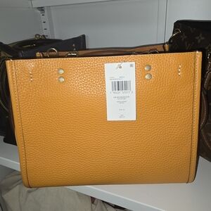 🚫SOLD ON ANOTHER PLATFORM 🚫Coach Rogue 25 papaya
